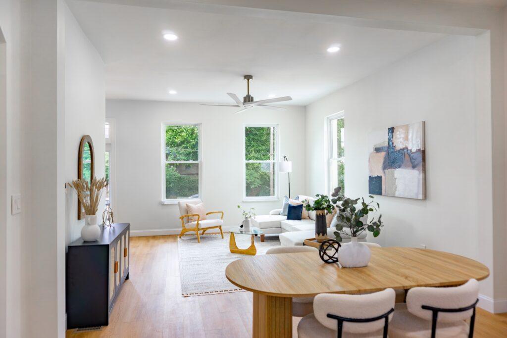 table with 4 chairs, windows and wood floors