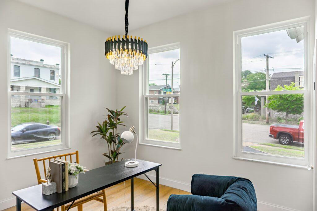 desk and seating with large windows