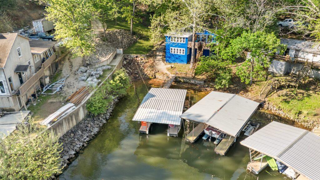 Aerial shot of a lakefront house and attached dock