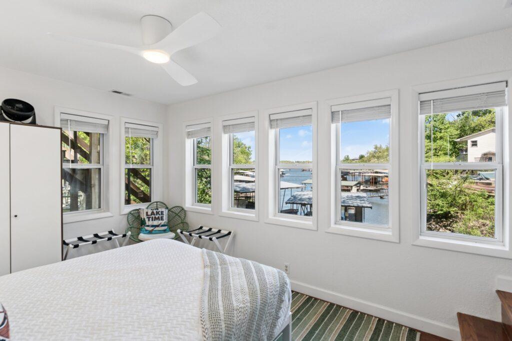 Bedroom with many windows