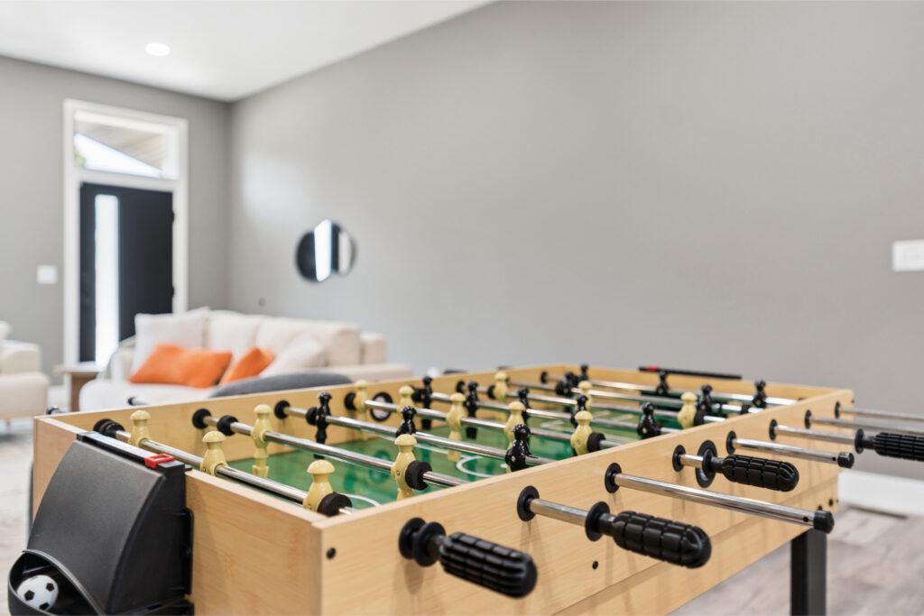 Close up of a foosball table in a living room